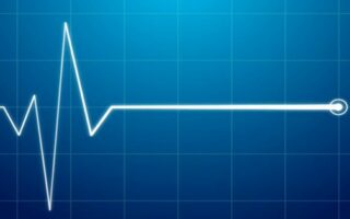 electrocardiogram waves on a digital display